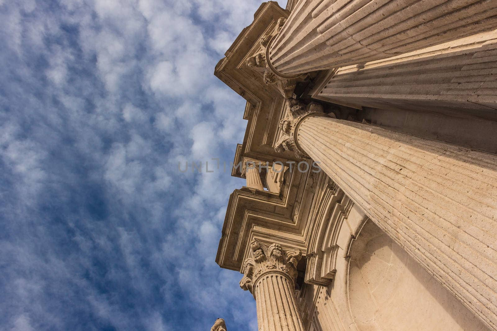 Detail of a italian baroque church on blue sky