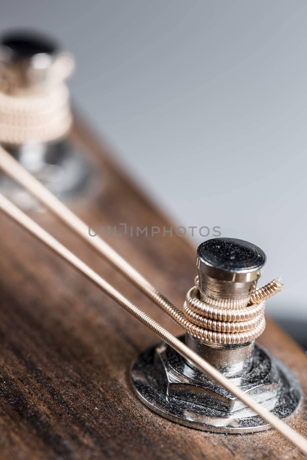 Steel Stringed Guitar Machine Head Part close up.