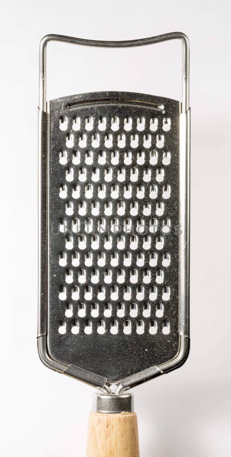 Grater Kitchen Utensil close up on white background.