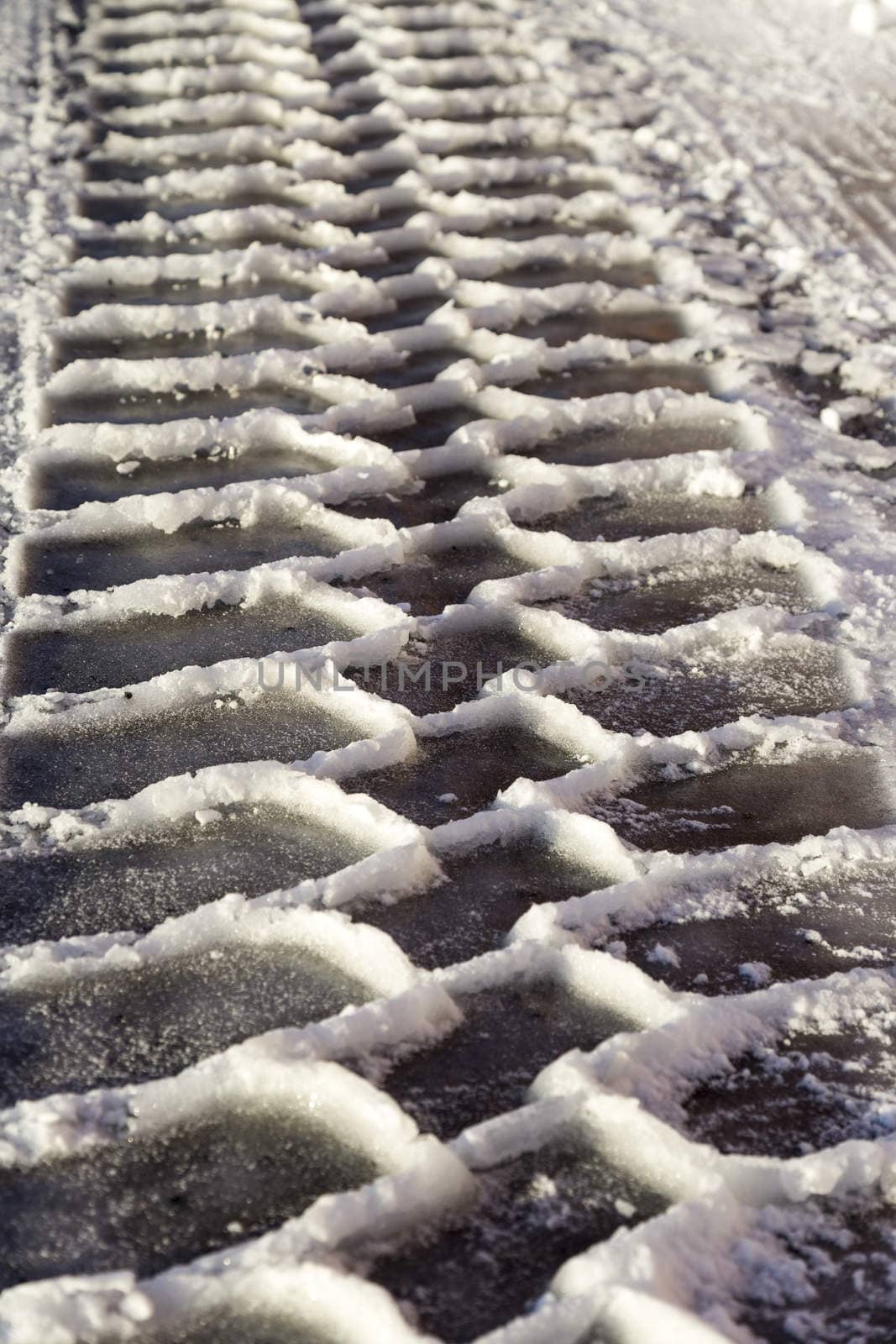 Tractor Track in Snow and ice.