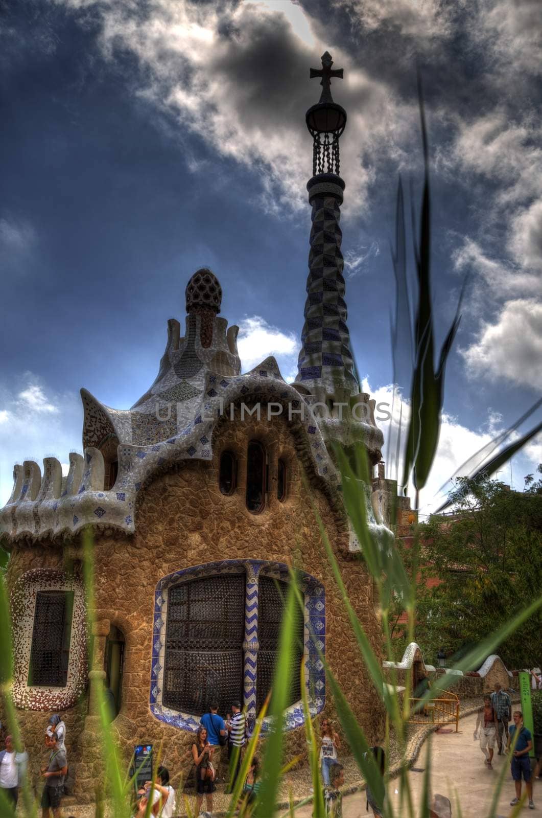 Barcelona, Spain - September 21, 2015: Trencalis covered Gatehouse at entrance to Parc Guell HDR
