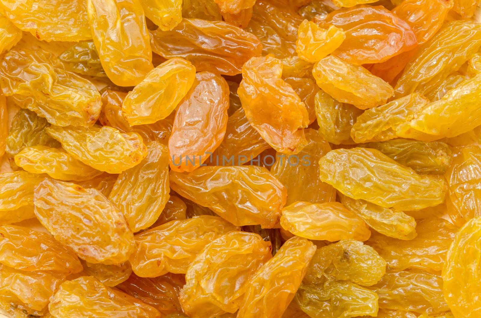 Golden raisins as background