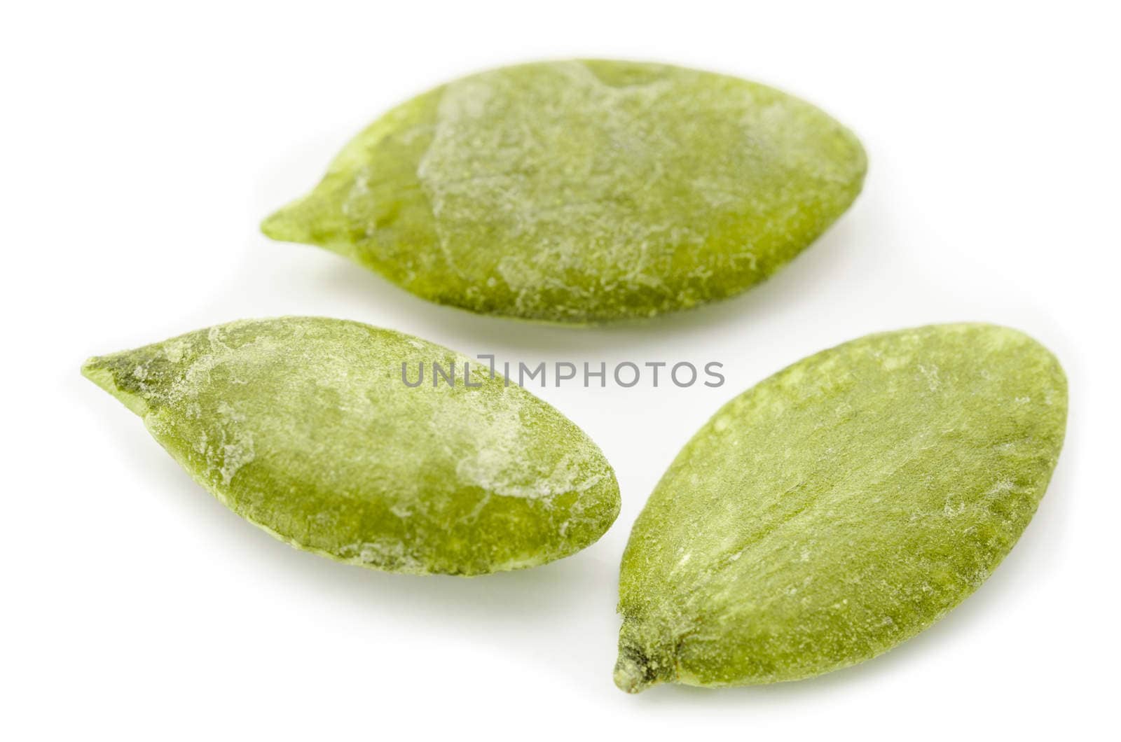 Dried Pumpkin Seeds isolated on white background.