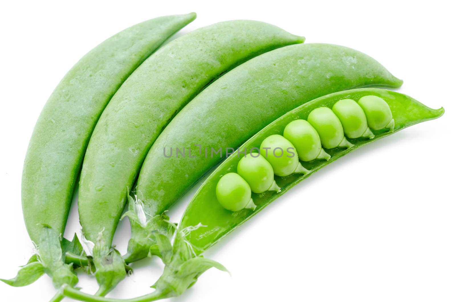 sugar snaps peas on a white background