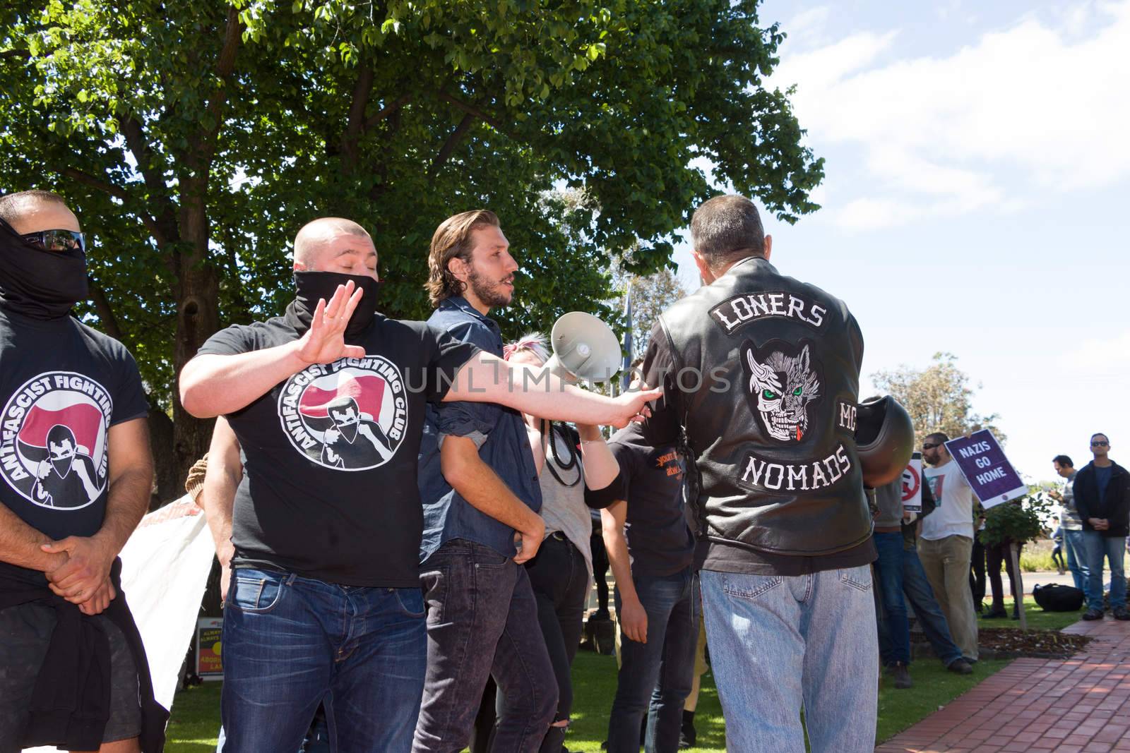 MELTON, VICTORIA/AUSTRALIA - NOVEMBER 2015: Anti Racism protesters violently clashed with reclaim australia groups rallying agsint Mulsim immigration.