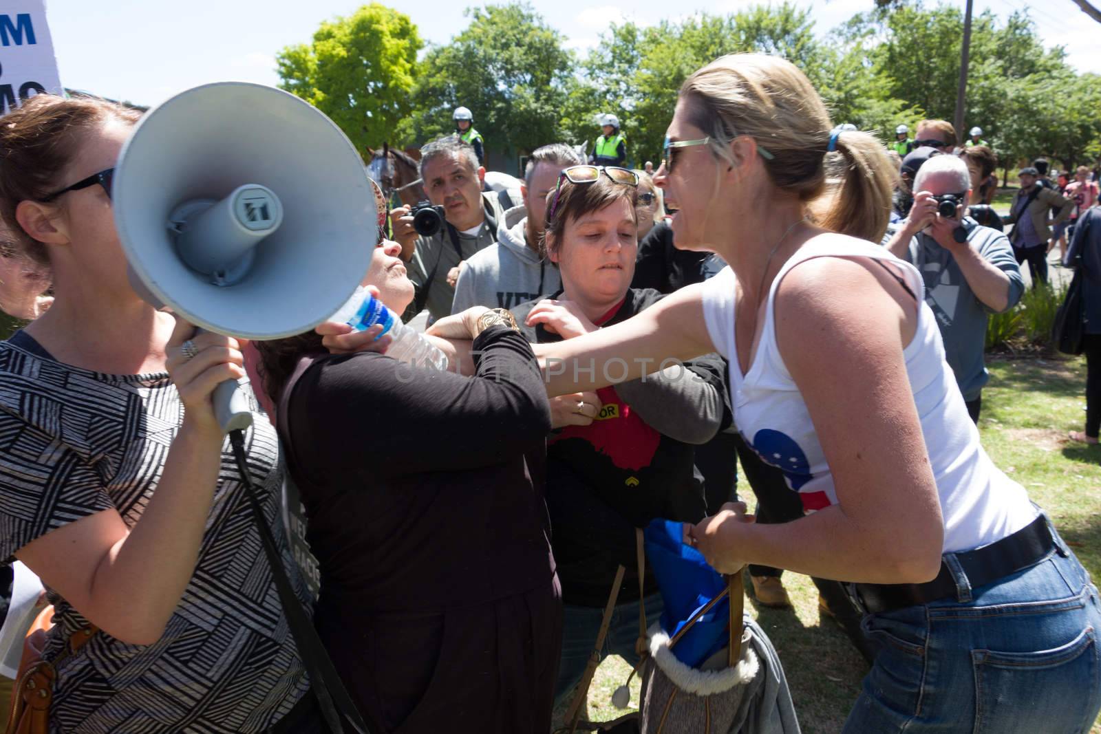 MELTON, VICTORIA/AUSTRALIA - NOVEMBER 2015: Anti Racism protesters violently clashed with reclaim australia groups rallying agsint Mulsim immigration.