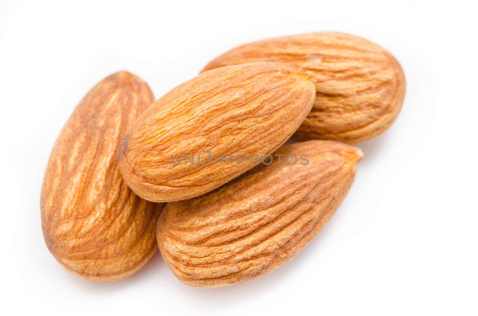 Close up Whole almonds on a white background.