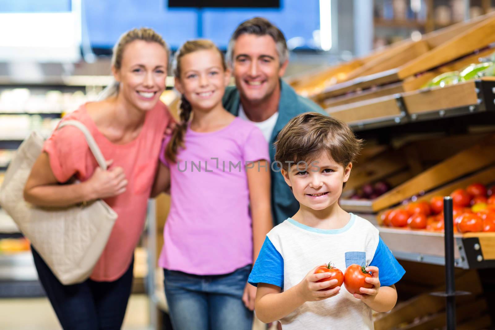 Young family doing some shopping by Wavebreakmedia