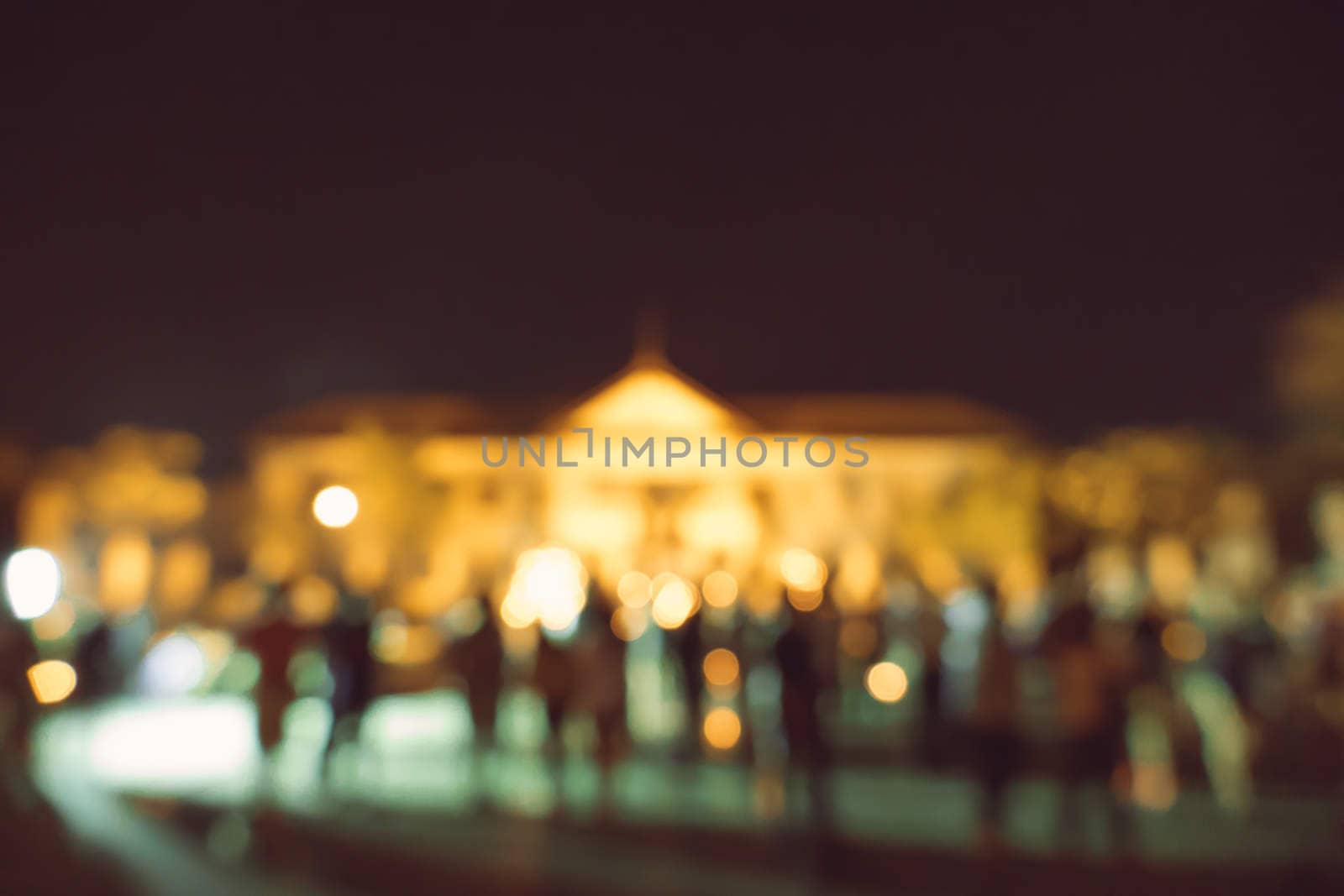 blurred city lights in the night by teerawit