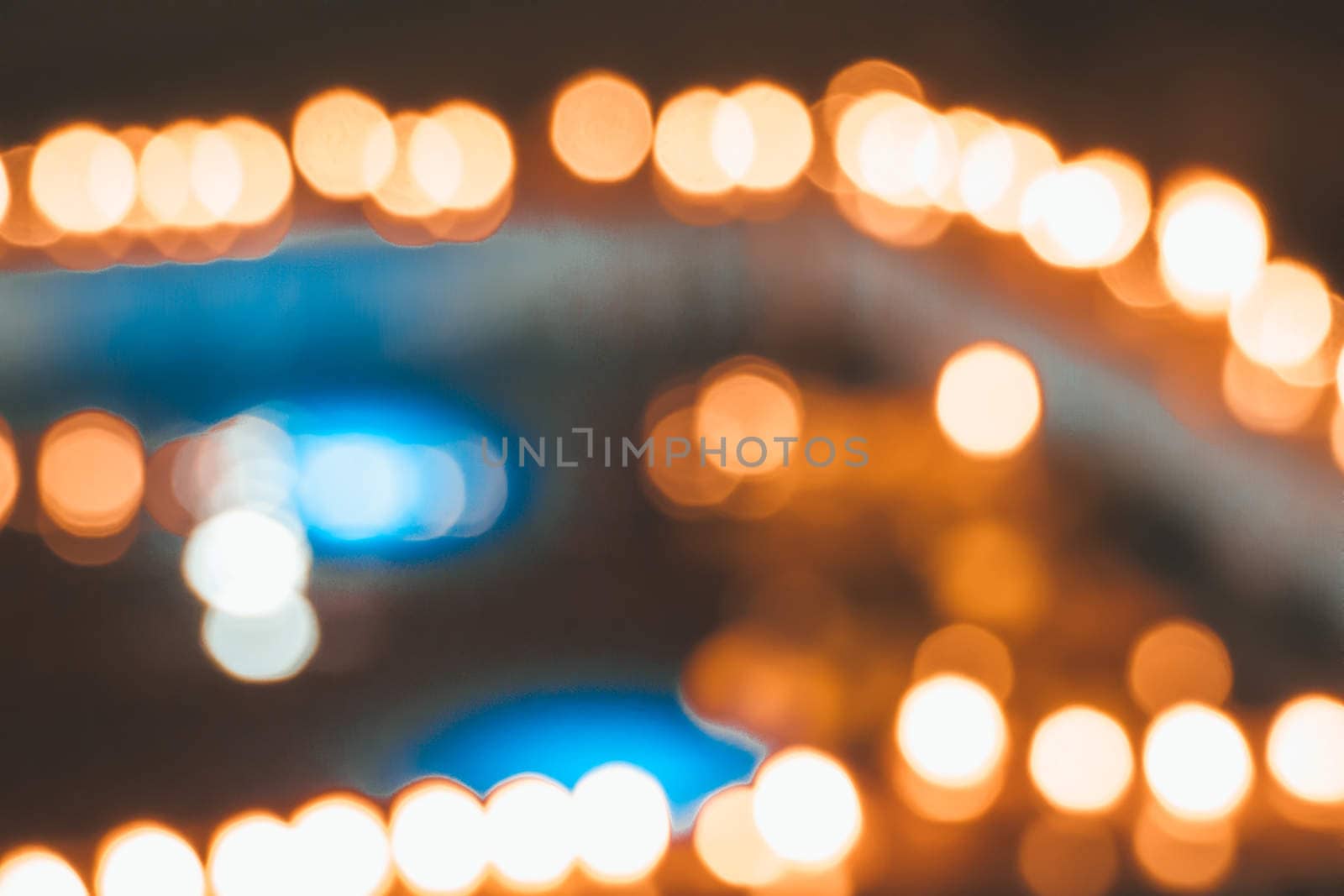 blurred city lights in the night by teerawit