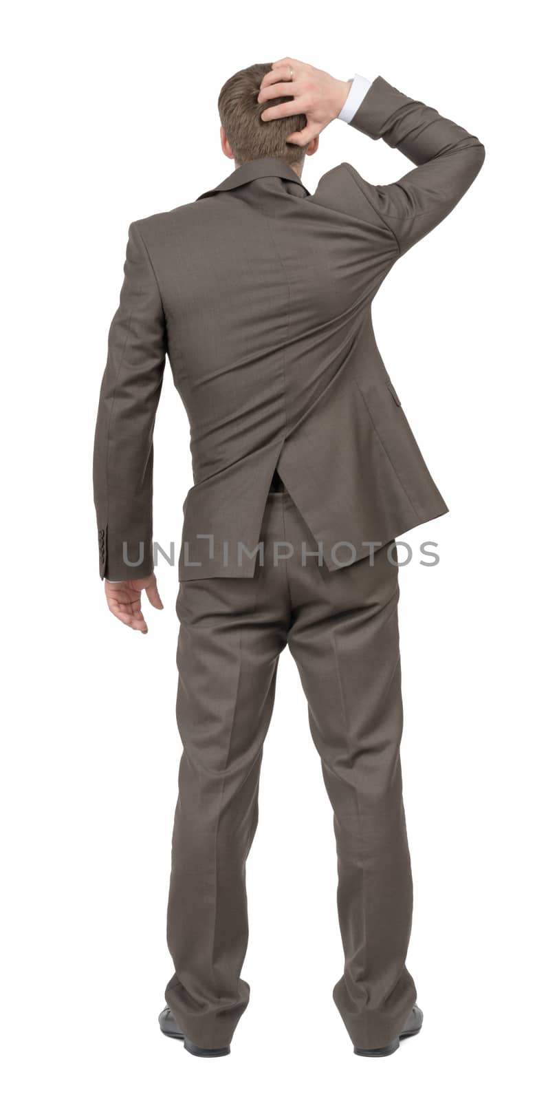 Thoughtful businessman on isolated white background, rear view