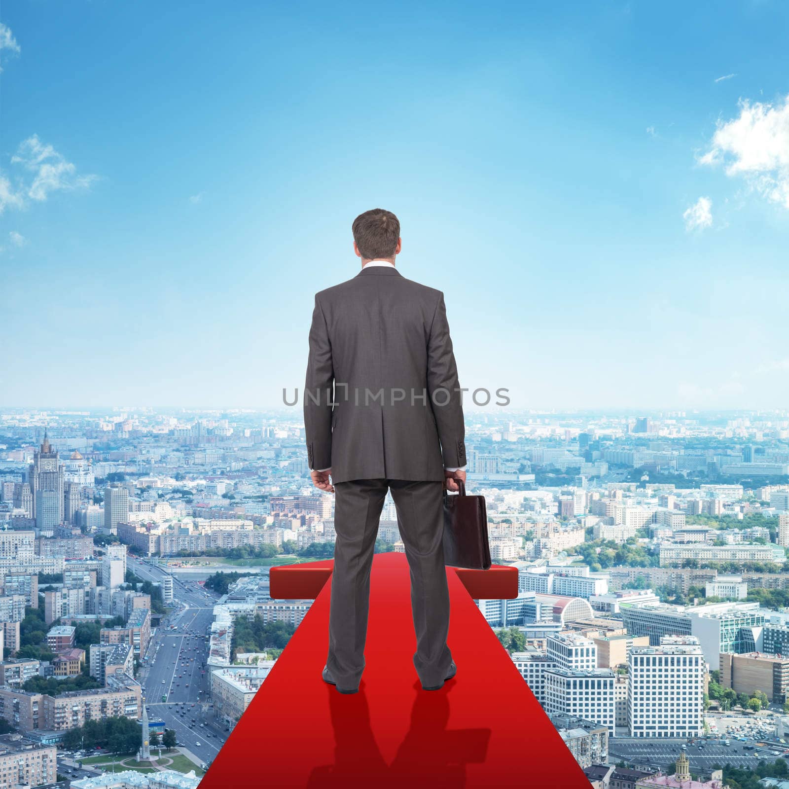 Businessman on red arrow above city by cherezoff