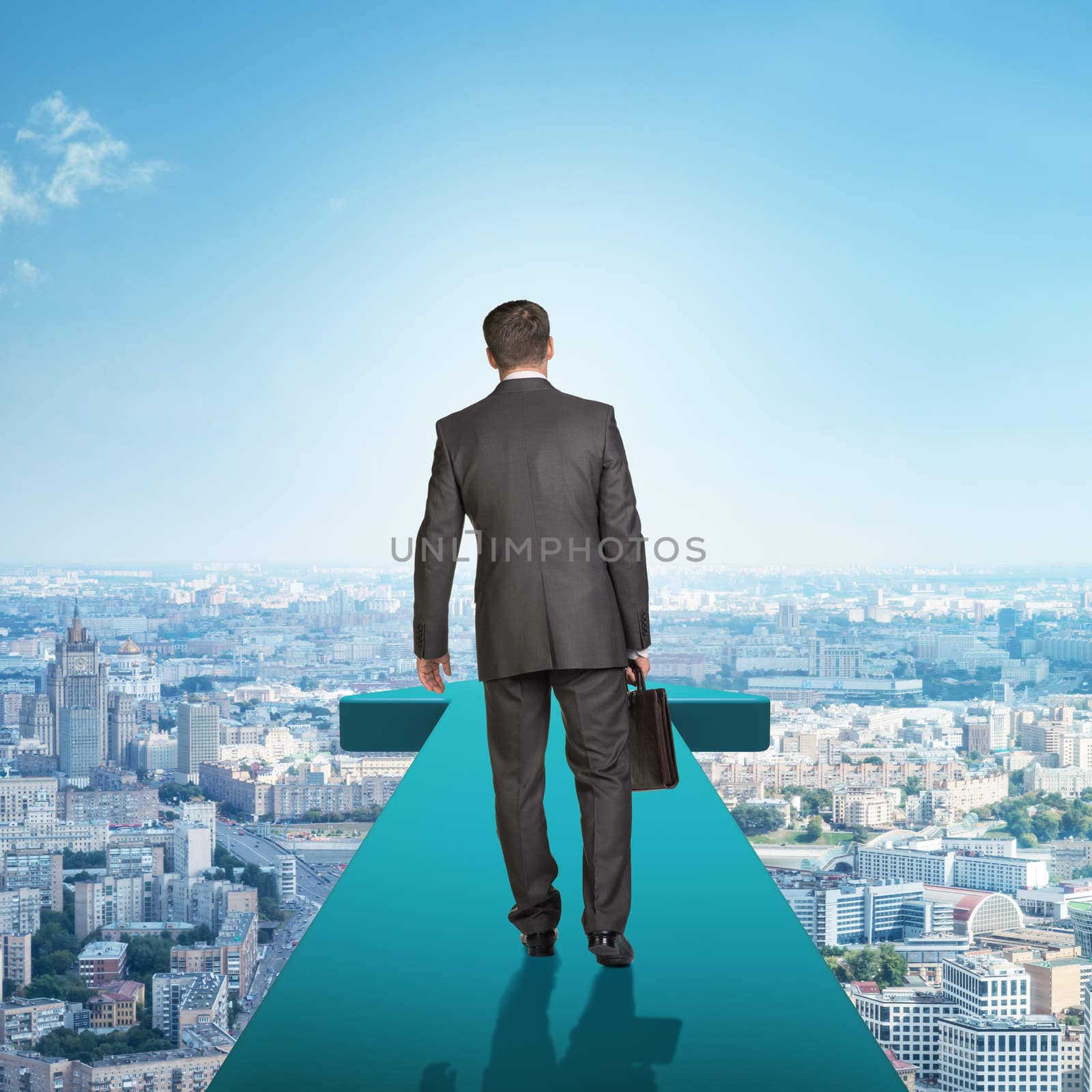 Businessman on blue arrow above city, rear view