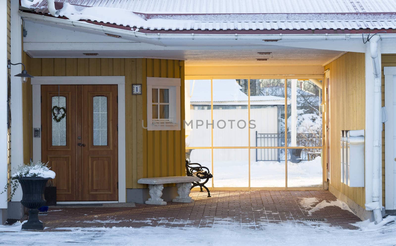 Entrance to House in Winter with snow.