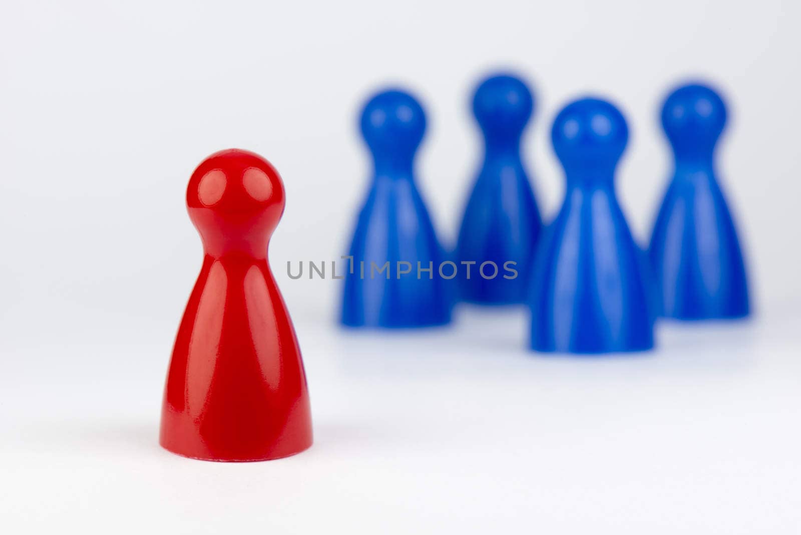 Conceptual game pawns that depict the concept different
