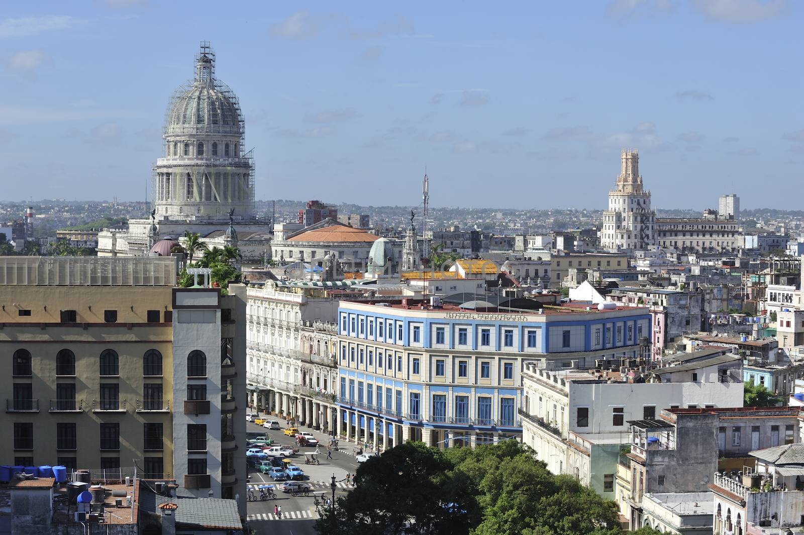 Havana, Cuba, August 2013.  Center of the city looks great in some parts: buildings renewed and streets are clean. Though in the neighborhood the houses are obsolete and dirty.