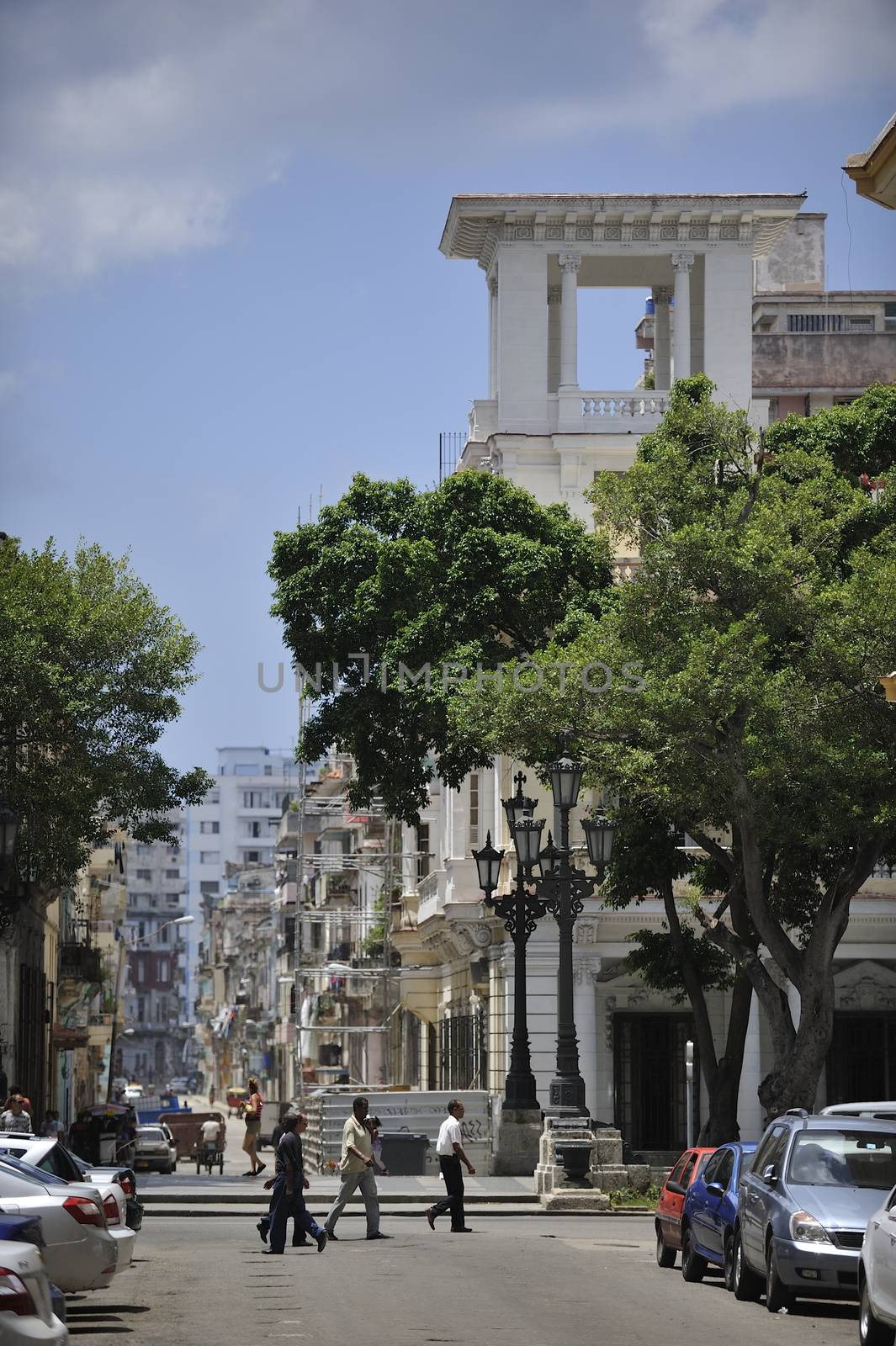 Havana, Cuba, August 2013.  Center of the city looks great in some parts: buildings renewed and streets are clean. Though in the neighborhood the houses are obsolete and dirty.