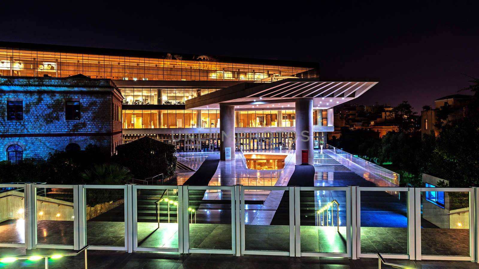 Night view of The Acropolis Museum,  an archaeological institution focused on the findings of the archaeological site of the Acropolis of Athens.