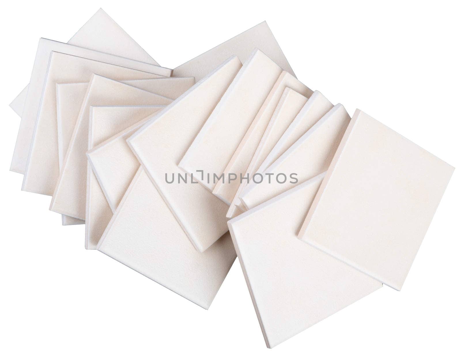 Stack of tiles on white, top view by cherezoff