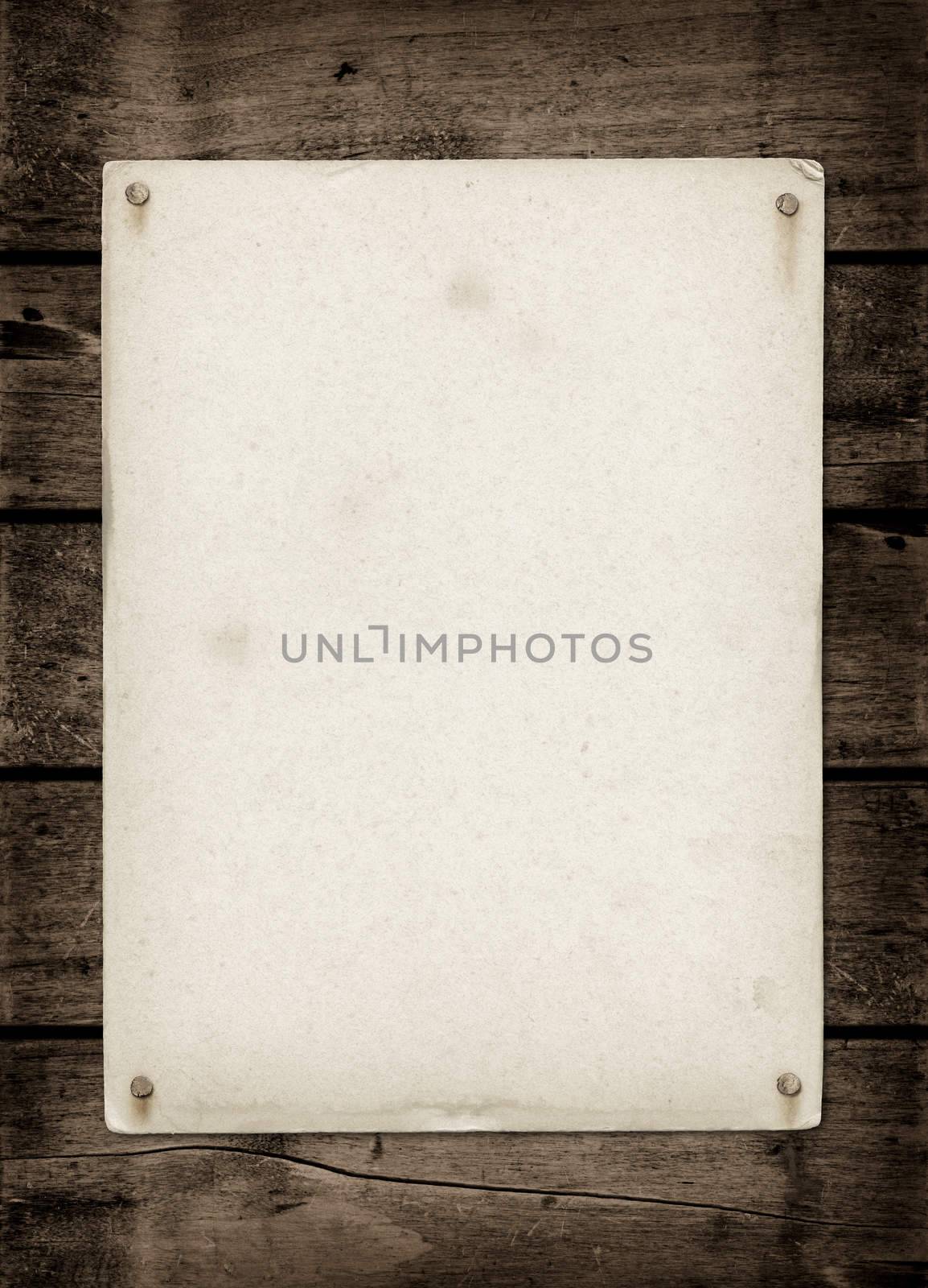 Old textured paper sheet on a dark wood table. horizontal Mockup