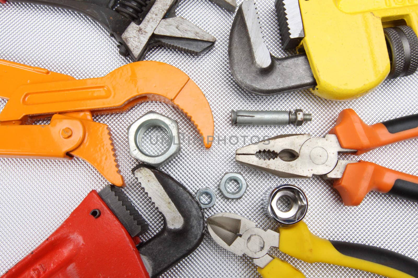 Hand tools  wrenches, pliers, nuts close up