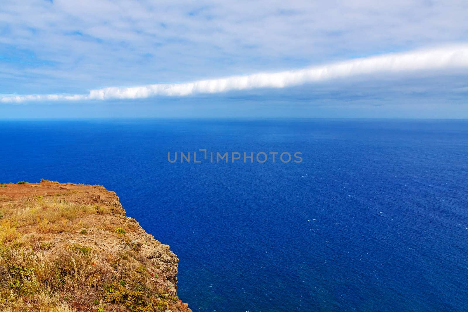 Madeiras westermost point - Ponta do Pargo - view of the deep blue Atlantic Ocean, unique cloud formation
