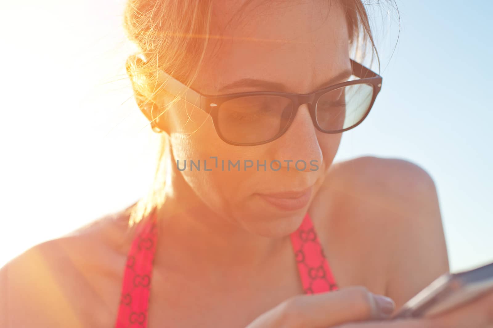 Woman at beach, close up still life portrait