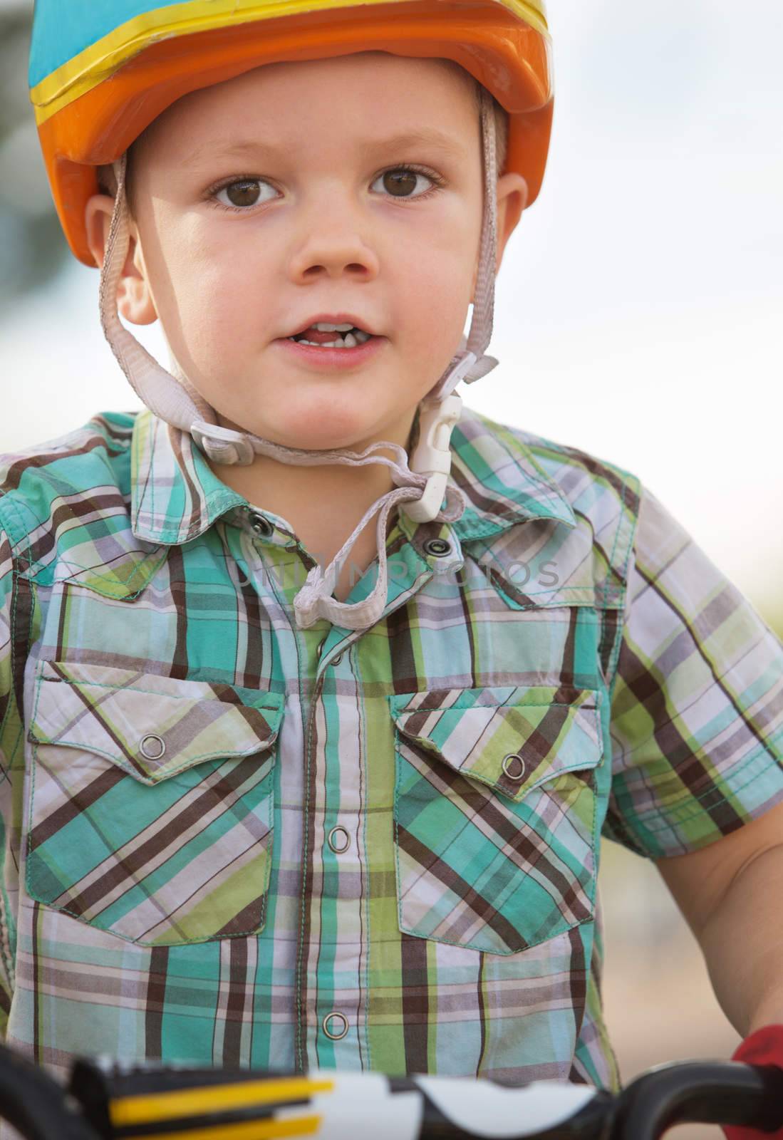 Close up of cute boy in bicycle helmet