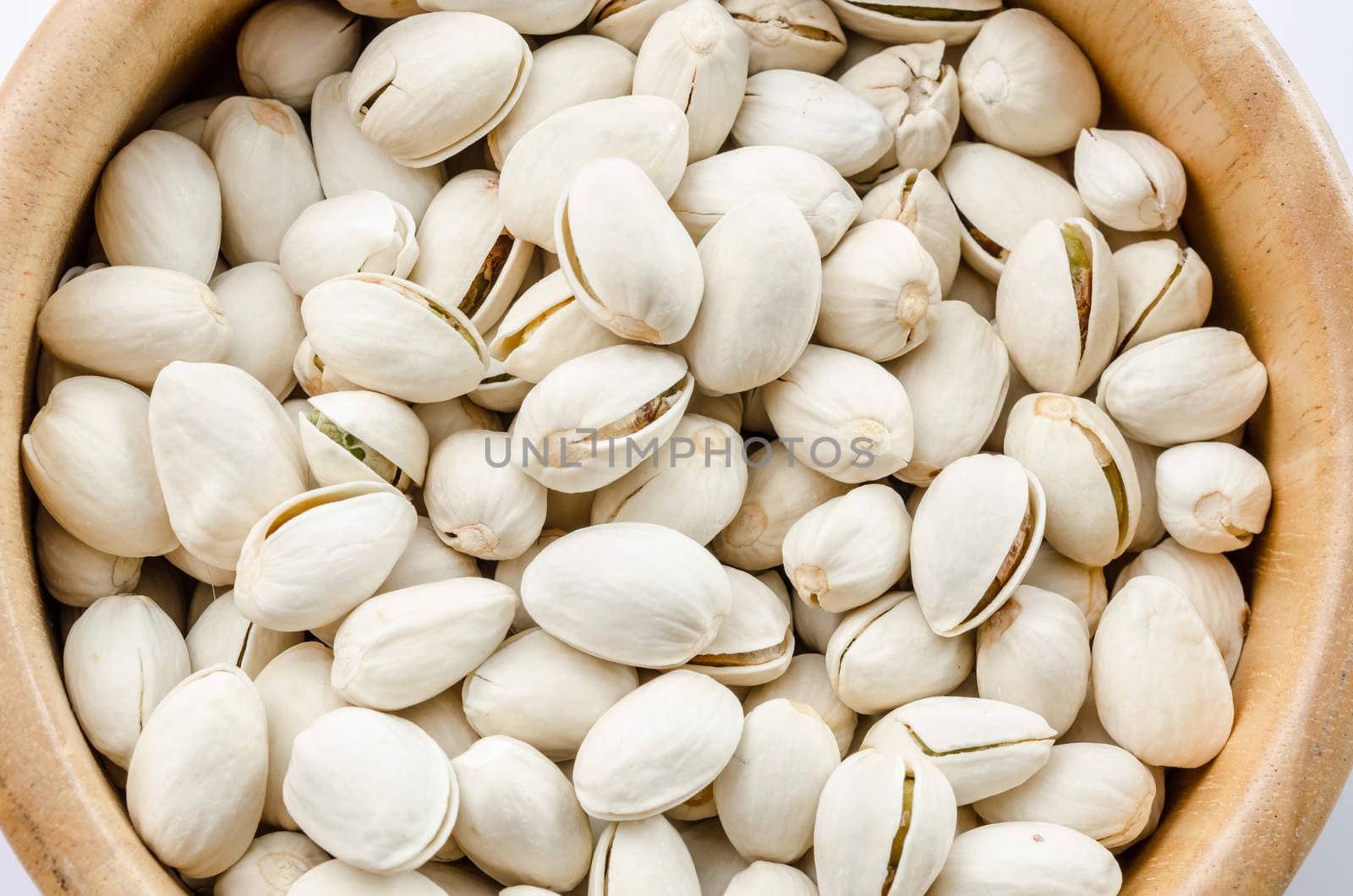 Close up Raw Organic Pistachio Nuts in a Bowl