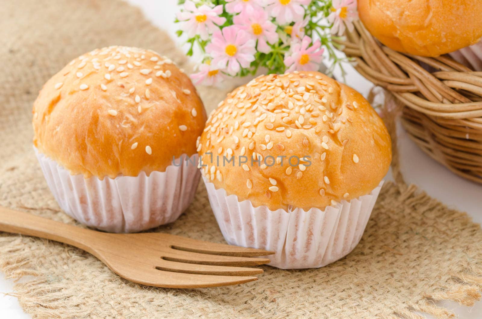 bread bun with white sesame and on sack background.