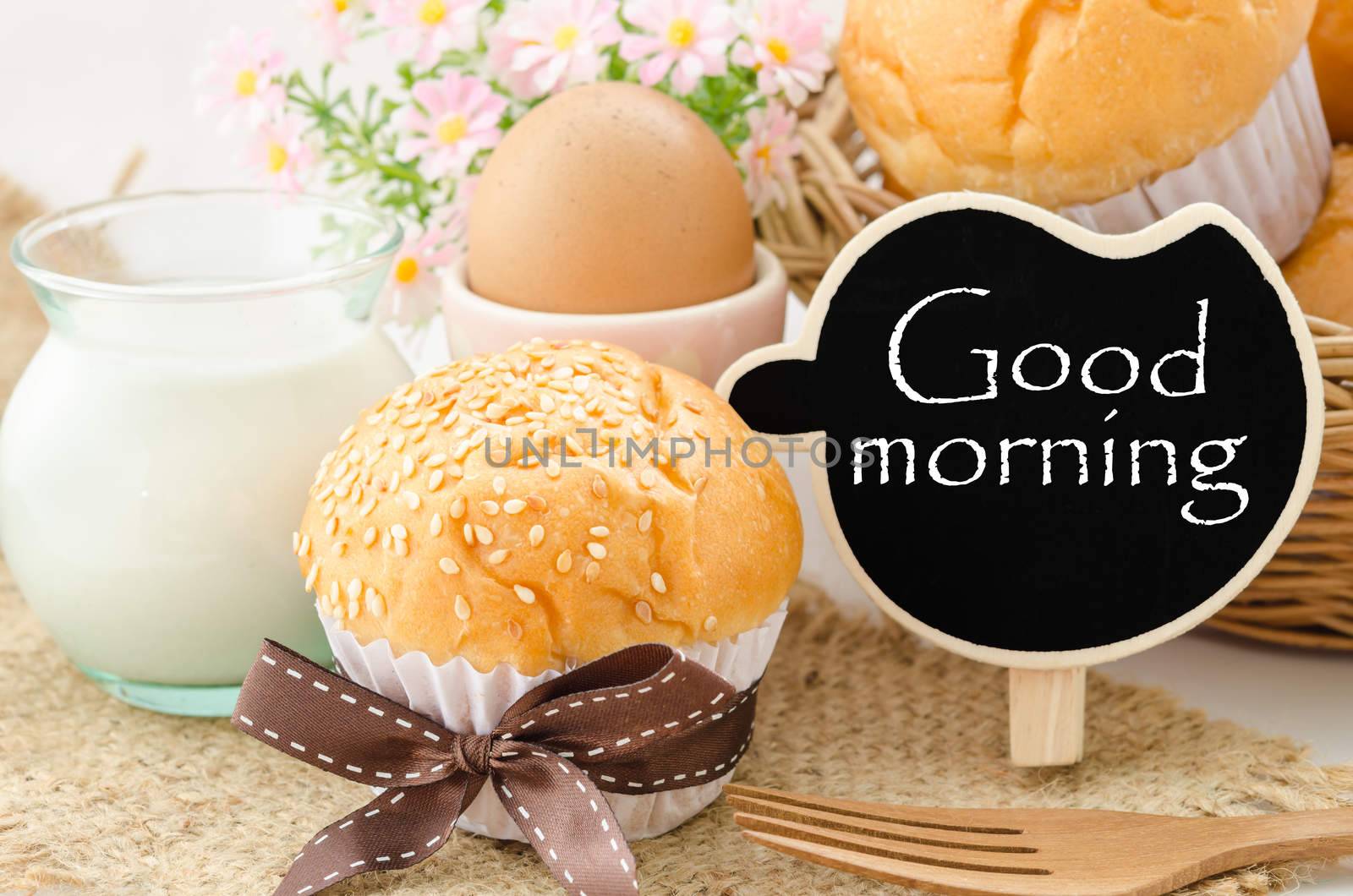 Good morning and breakfast, bread bun, milk, egg and blak tag.