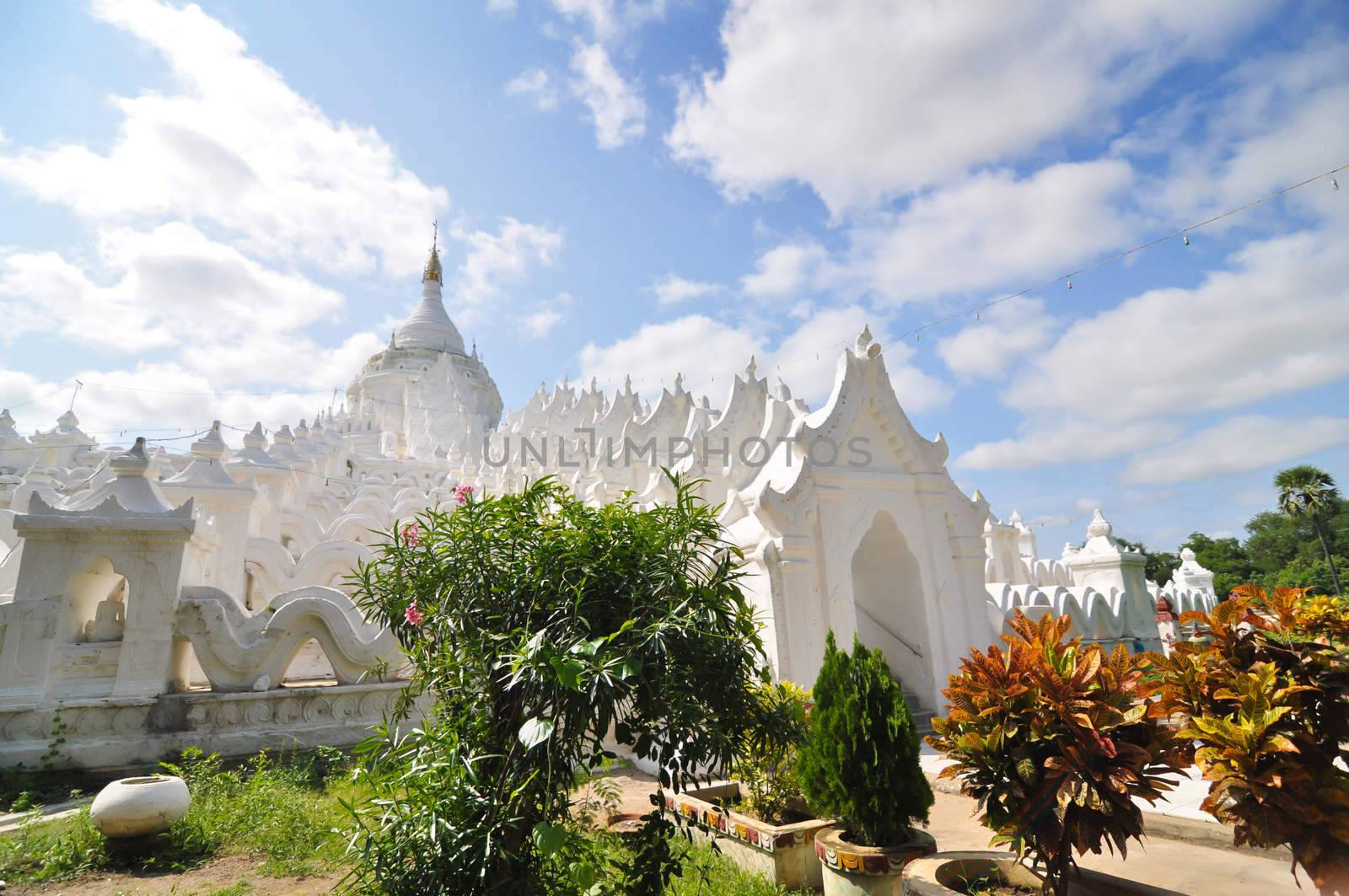 White pagoda of Hsinbyume (Myatheindan) paya temple in Mandala by siraanamwong