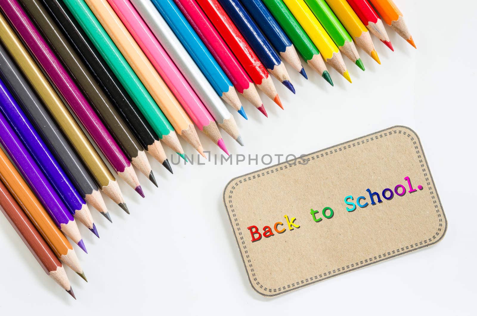 Colorful pencil crayons on a white background, Back to school