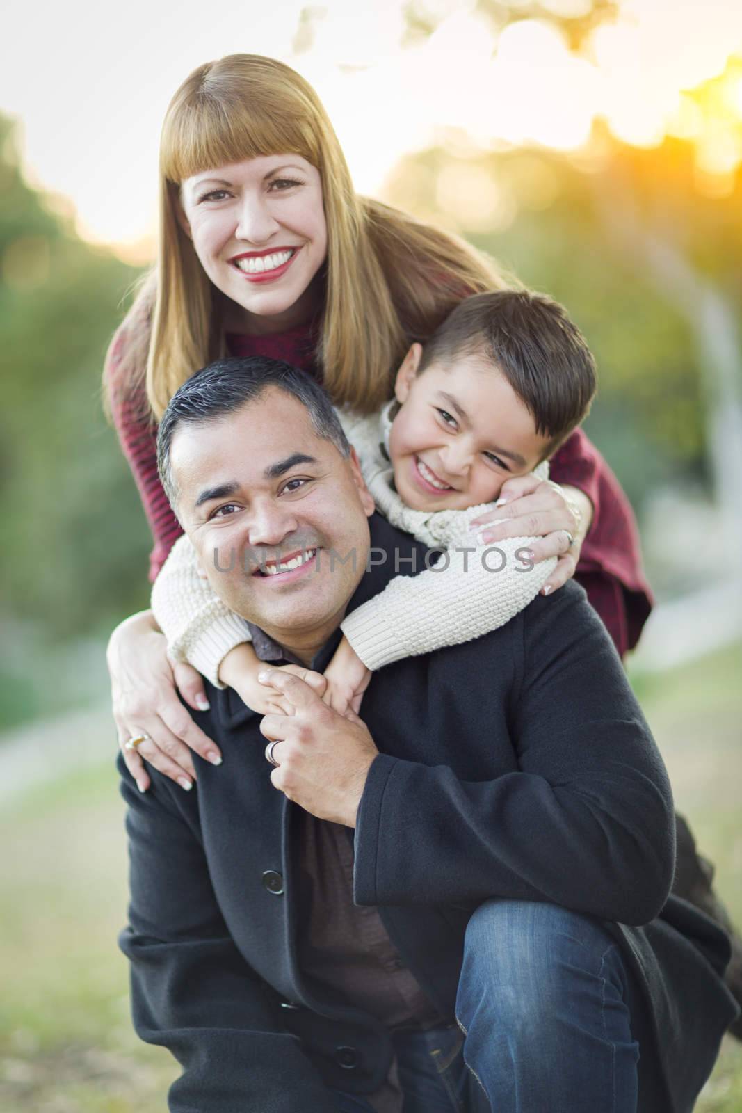 Young Mixed Race Family Portrait Outdoors by Feverpitched