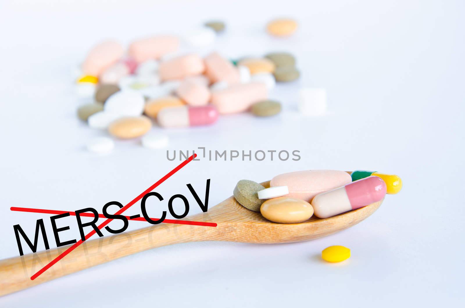 Mers-Cov ,Concept drugs for Stop MERS-CoV (Middle East Respiratory Syndrome Coronavirus) Tablets on wooden spoon
