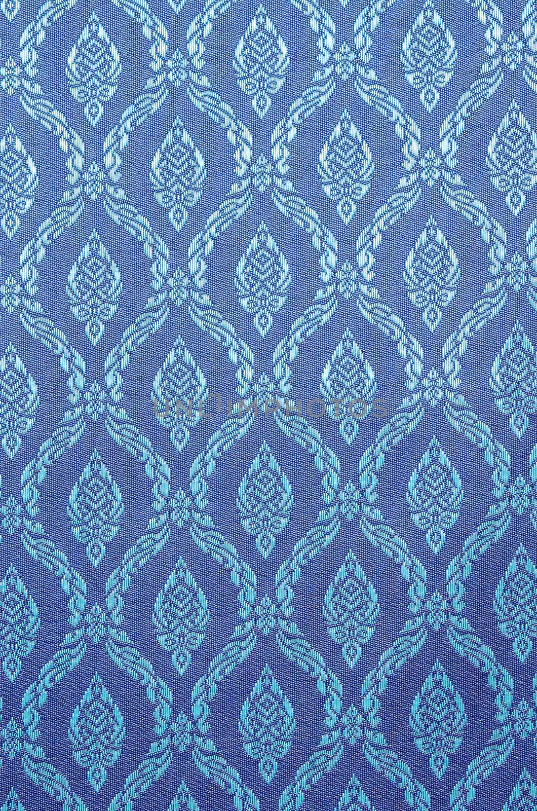 Thai art blue wall pattern. by Gamjai