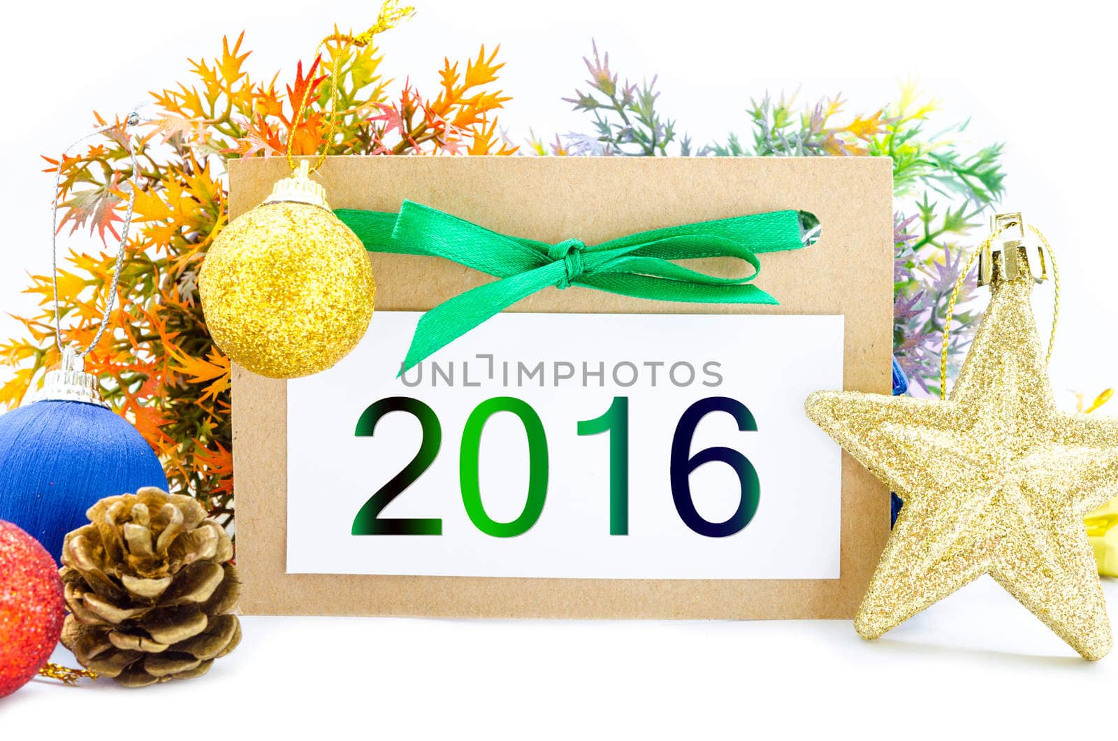 2016 on brown tag paper new year decoration on white background.