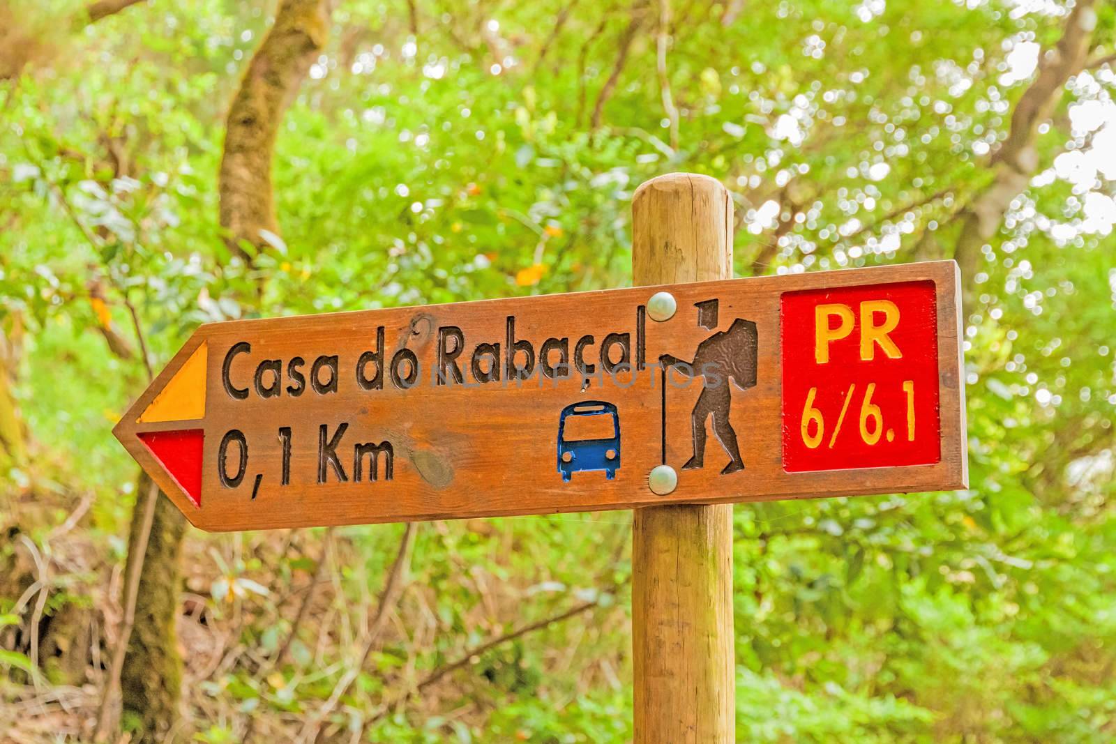Signpost showing the way to Casa do Rabacal, a famous walk trail for hikers on island of Madeira.