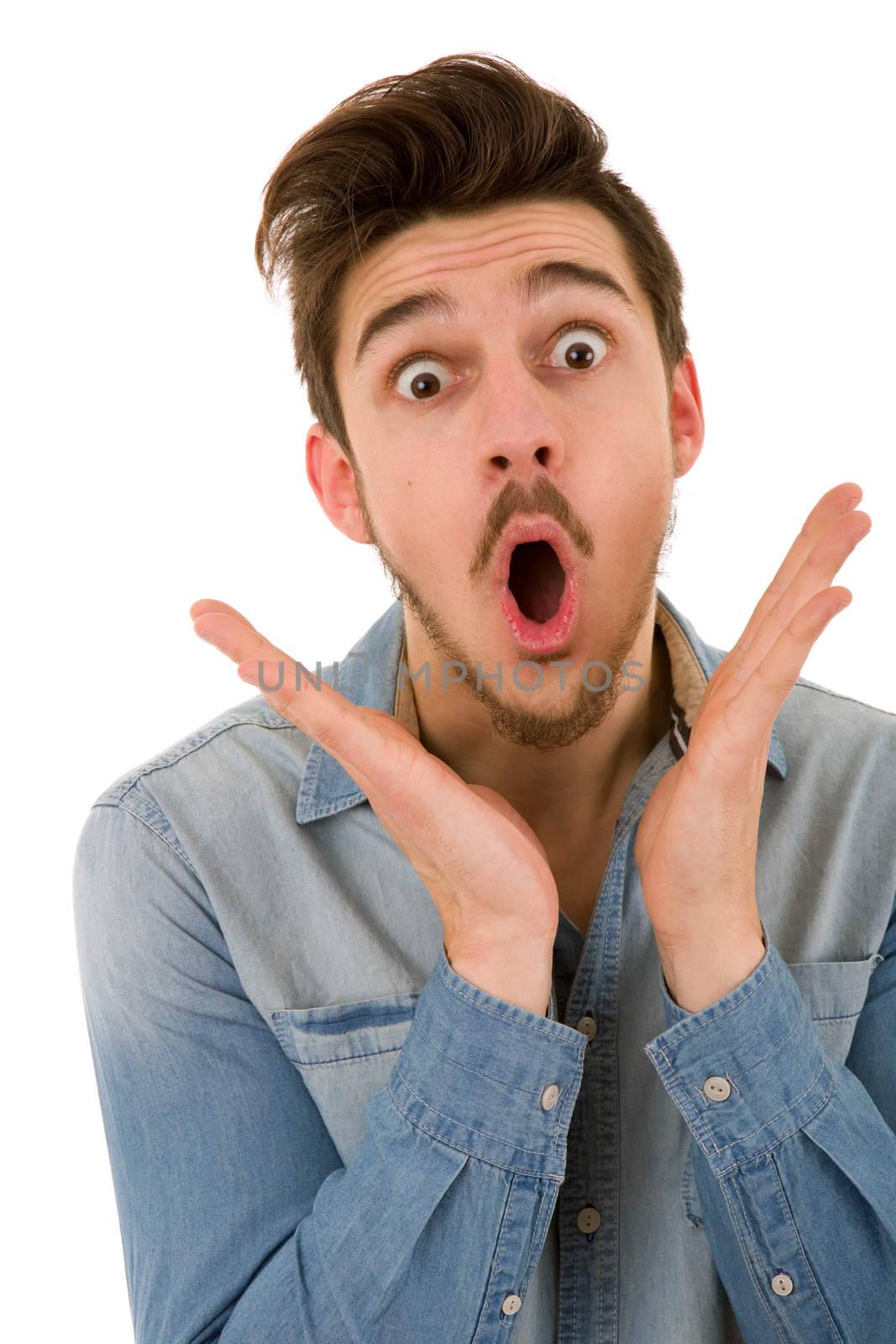 young casual surprised man portrait in a white background