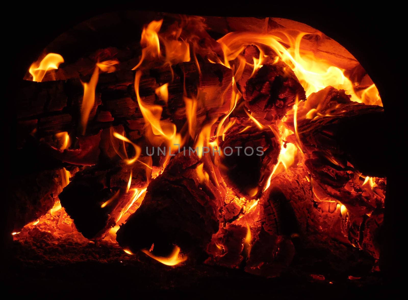 embers and the fire in the stove in Russian Karelia, February, 2015