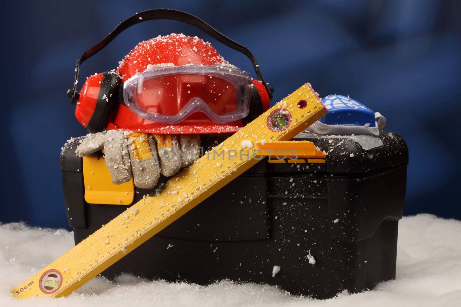 Safety New Year- protective equipment on artificial snow