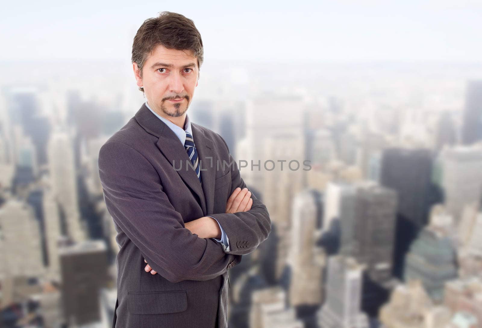 young business man portrait at the office