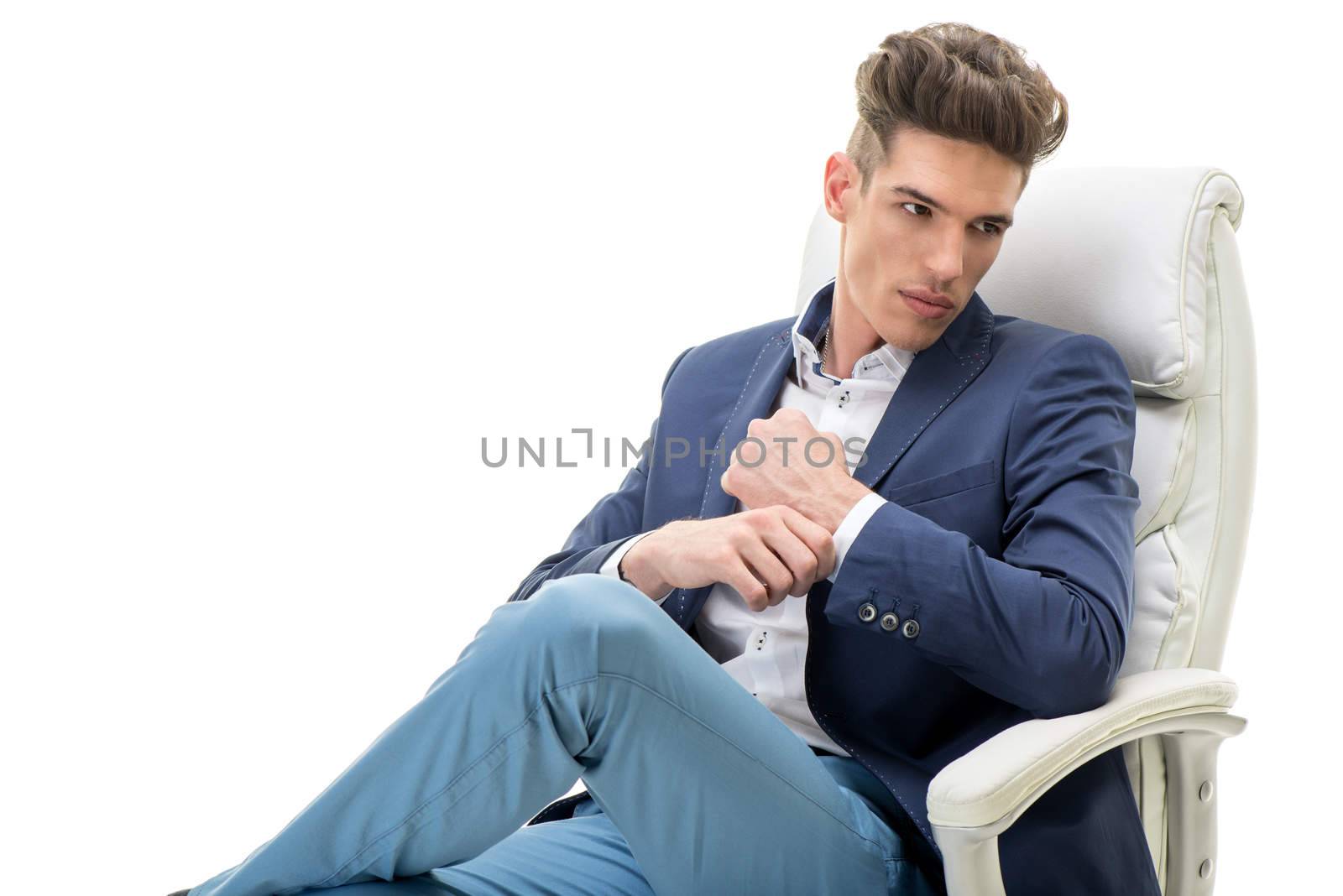 Studio shot of a handsome and well-dressed young man. White background.