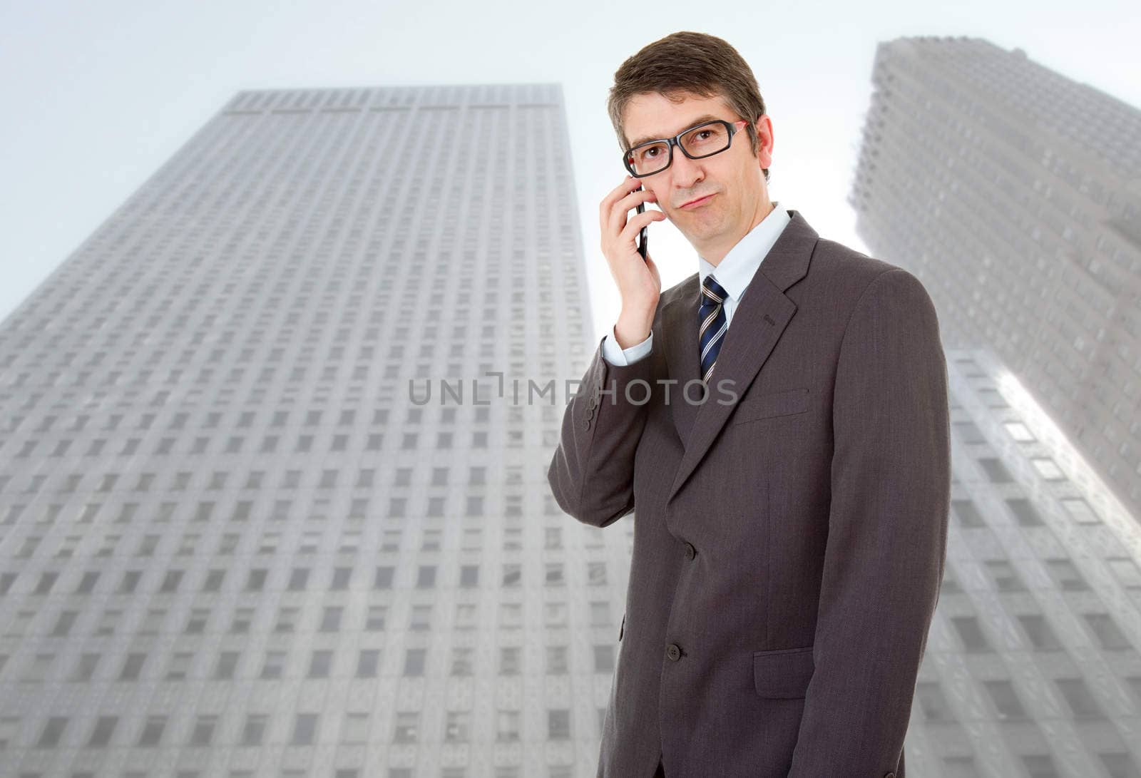 young business man on the phone, at the office