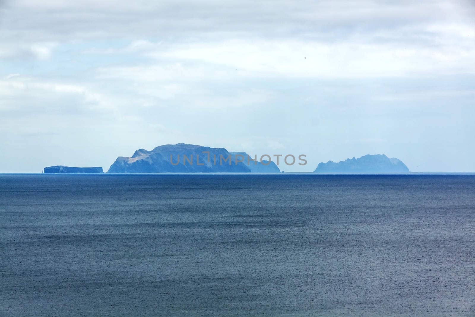 Islands (Ilhas Desertas) in the east of Madeira, from left to right named Chao, Deserta Grande, and Bugio - view from town Canical