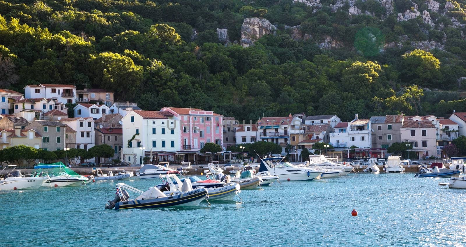 BASKA, KRK, CROATIA - 14 JUL 2015: Mooring boats in the resort town. Morning shooting.