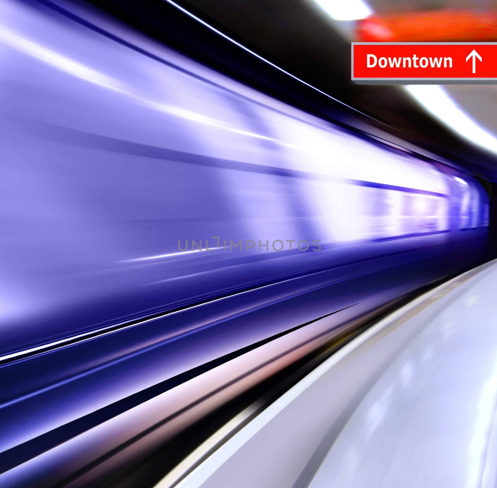 super streamlined train with motion blur moves in subway