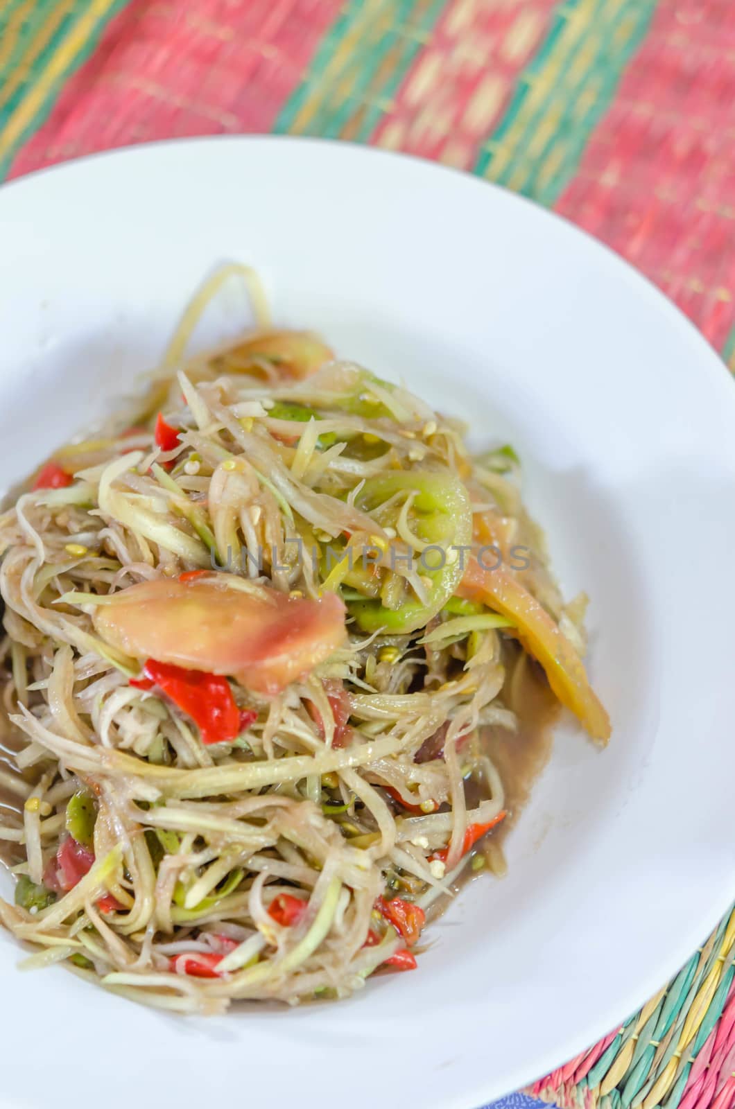 Famous Thai food, spicy papaya salad or "Somtum" in Thai