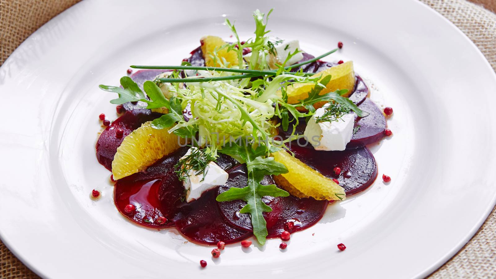salad of roasted red beets and feta cheese with olive oil