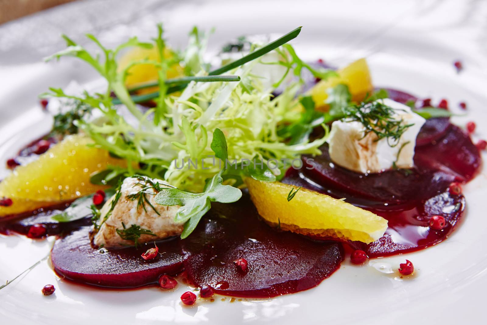 salad of roasted red beets and feta cheese with olive oil